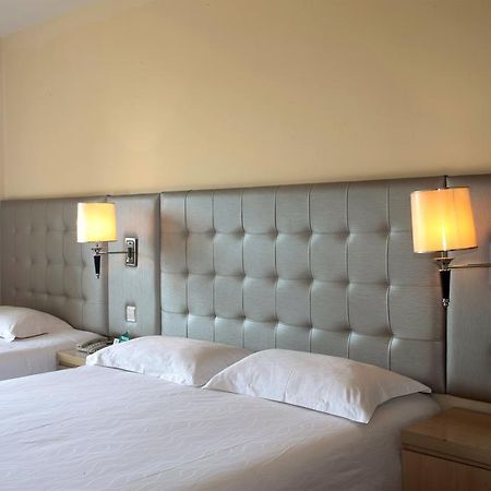 Qingdao Renjia Bussiness Hotel Dış mekan fotoğraf