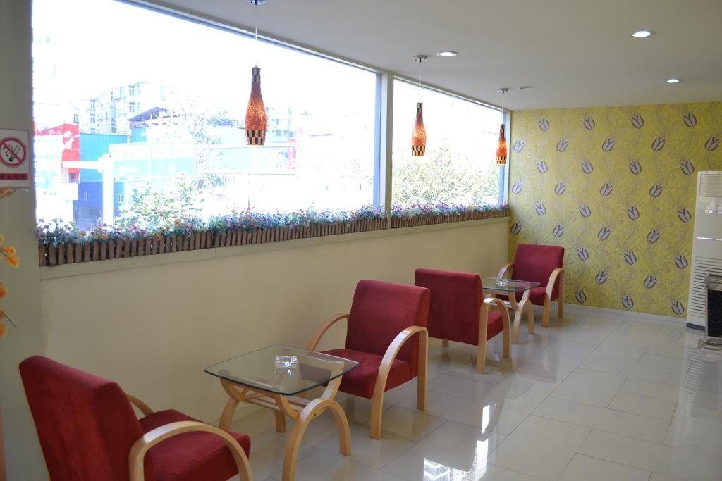 Qingdao Renjia Bussiness Hotel Oda fotoğraf